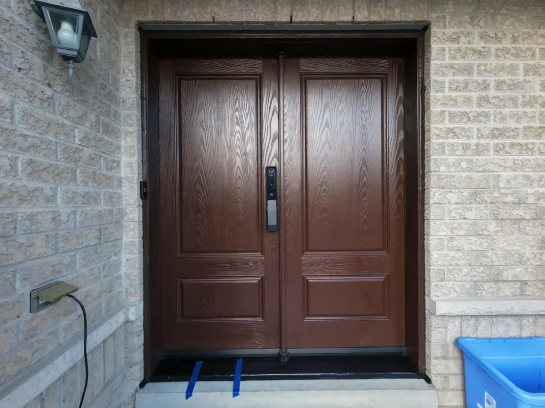 1 flawless Oak Grain Fiberglass Door Ajax installation featuring solid double doors by MapleFort Doors.
