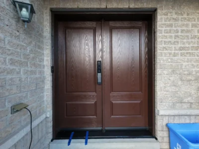 1 flawless Oak Grain Fiberglass Door Ajax installation featuring solid double doors by MapleFort Doors.