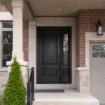 F27 fiberglass entry door with decorative sidelite installed on a Canadian home entrance
