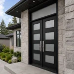 S51 steel double entry door installed on a Canadian modern stone home entrance